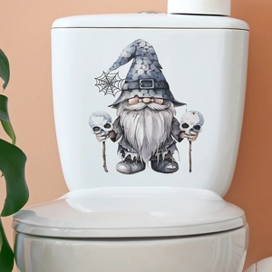 Detailed view of Halloween gnome skeleton sticker applied on a white toilet tank surface