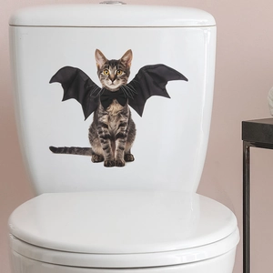 Halloween cat sticker with bat wings on a toilet tank, cute home bathroom decor
