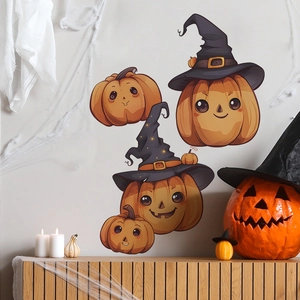 Detailed view of cute Halloween pumpkin wall stickers with witch hats in a home interior setting