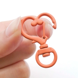 Chiusura a moschettone a cuore arancione opaco con girevole a 360 gradi per fai da te