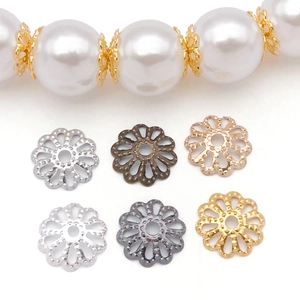 Close-up of 7mm 9mm hollow flower bead caps in six colors for DIY jewelry making