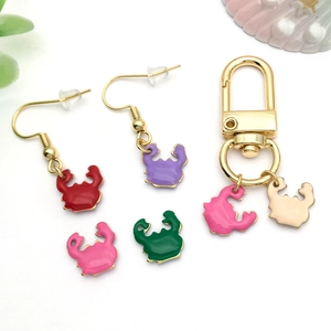 Gold-plated stainless steel crab enamel charms and earrings set in various vibrant colors