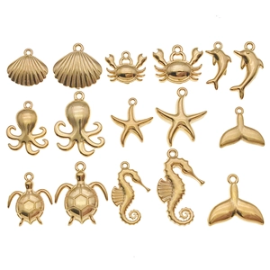 Golden stainless steel ocean theme DIY charms set featuring starfish, whale tails and turtles