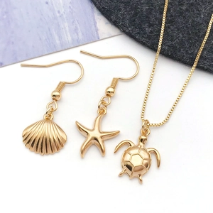 Gold vacuum plated stainless steel ocean jewelry set with shell starfish and turtle pendants