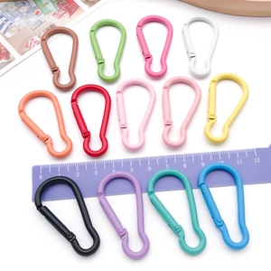 Detailed top view of colorful 5cm gourd-shaped aluminum alloy carabiners in 12 assorted colors