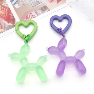 Colorful resin balloon dog charms with heart-shaped clasps for DIY bag accessories