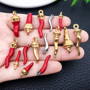 Italian Cornicello horn pendants in red, gold, and silver finishes for jewelry DIY