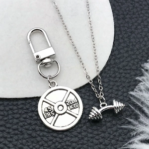 Silver fitness jewelry set with 45 LBS weight plate keychain and dumbbell pendant necklace