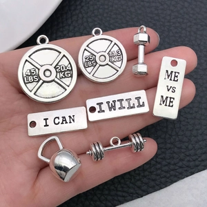 Antique silver fitness charms set featuring dumbbells, barbells and motivational plates