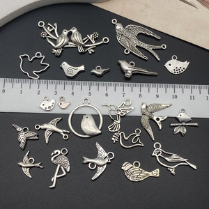 Mixed set of antique silver bird alloy pendants for DIY jewelry making and crafts