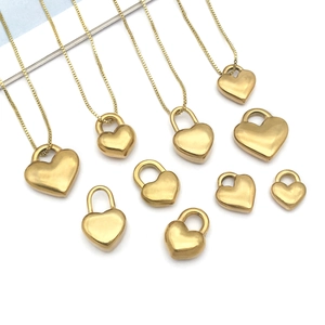 Pendentifs cadenas cœur en acier inoxydable doré et collier à chaîne croisée assorti