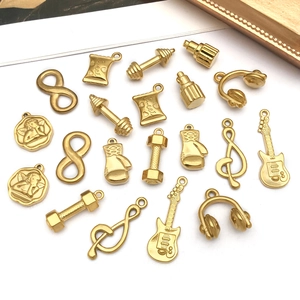 Detailed collection of assorted gold-plated stainless steel charms for DIY jewelry making
