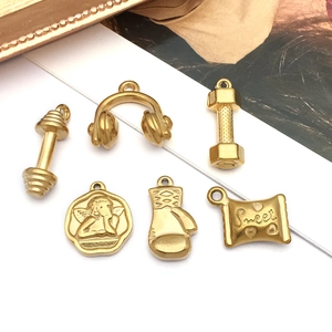 Golden stainless steel DIY charms including dumbbell, headphones and angel relief pendants