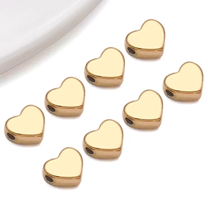 Macro di 8 perline distanziatrici a cuore dorate in acciaio inox per gioielli fai da te