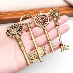Set of four vintage antique bronze skeleton keys made of zinc alloy for DIY necklaces