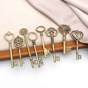 Set of 8 vintage bronze alloy skeleton keys featuring heart, hollow, and love designs
