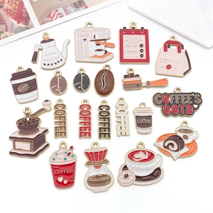 Detailed macro view of coffee themed enamel alloy charms for DIY jewelry making