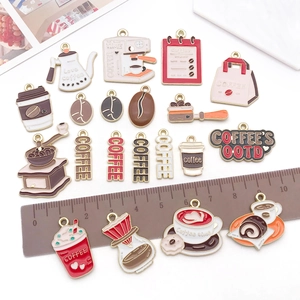 DIY enamel coffee charm collection for necklaces with cups and grinders on a white background