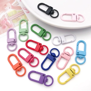 Detailed macro shot of multi-colored swivel lobster clasps for DIY jewelry and crafts
