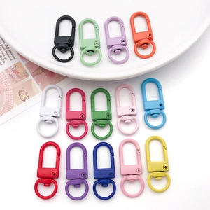 Flat lay of colorful matte alloy lobster clasps for DIY jewelry and keychains