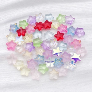 Macro shot of 8mm star-shaped gradient glass beads for DIY jewelry making accessories