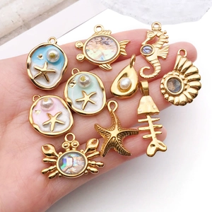 Golden sea animal charms set with shells and pearls for DIY jewelry making