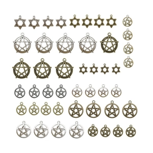 Assorted vintage metal star charms in bronze, silver, and black for DIY jewelry making