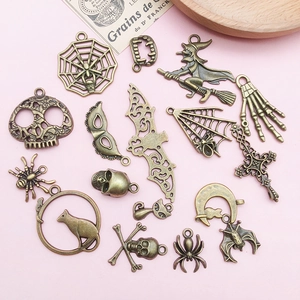 Assorted Halloween antique bronze alloy charms including skulls and spider webs for DIY crafts