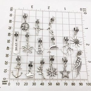 Set of 14 antique silver alloy charms featuring stars and crowns for DIY jewelry making