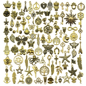 Platliggende antieke gouden legering bedeltjes in diverse vormen voor DIY sieraden