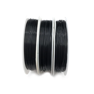 Three rolls of black elastic jewelry cord for DIY bead bracelets on white reels