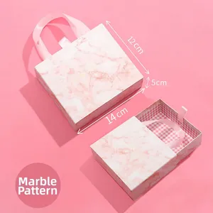 Pink marble pattern gift box detail with silk handle and dimensions 14x12x5cm