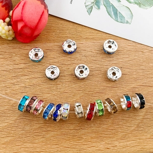 Close-up of assorted colorful rhinestone spacer beads for DIY jewelry making