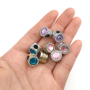Macro view of crystal large hole beads with silver and gold plating for DIY bracelets