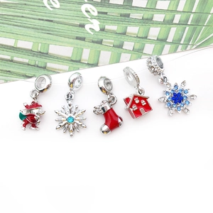 5-piece set of Christmas charms including Santa, snowflake, and sock for DIY jewelry