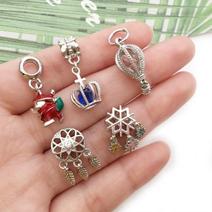 Christmas enamel charms collection including Santa Claus, snowflake and dreamcatcher pendants