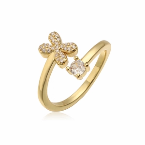Detail van verstelbare gouden ring met zirkonia bloem en ronde solitaire steen