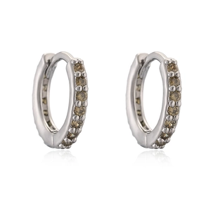 Close-up of silver hoop earrings with a vertical row of round-cut brown zircons