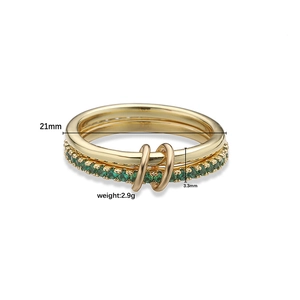 Luxurious gold double interlocking ring with green stones, weighing 2.9g and 21mm diameter