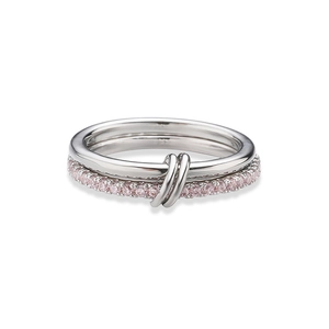 Detail view of double-layered silver ring featuring pink pavé set crystals and link connector