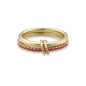 Detail of 18K gold double ring featuring interlaced bands and pink pavé set stones