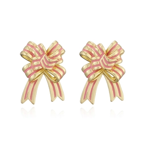Detailed close-up of pink enamel bow stud earrings with a shiny gold finish