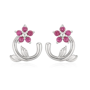 Detailed view of silver flower earrings with pink zircons and delicate leaf motifs