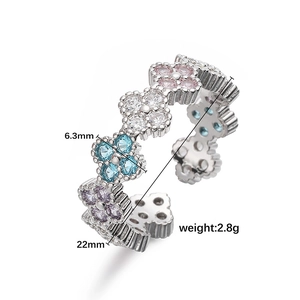 Luxury copper clover ring with colorful zirconia stones in an adjustable open band