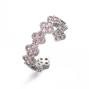 Detail of silver clover ring with pink zircons and adjustable flower petal band
