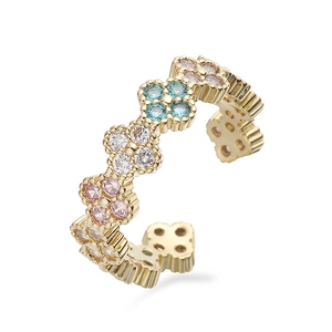 Elegant gold clover ring with colorful zircon crystals and adjustable open band