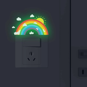 Luminous rainbow light switch sticker with glowing sun and clouds for wall decoration