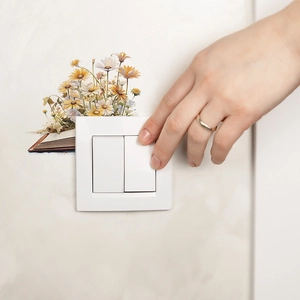Autocollants muraux marguerites romantiques pour décorer un interrupteur double