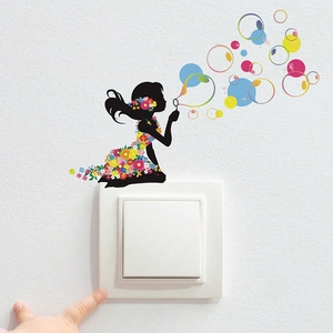 Glow-in-the-dark girl wall sticker featuring a floral dress and bubbles for switch decor