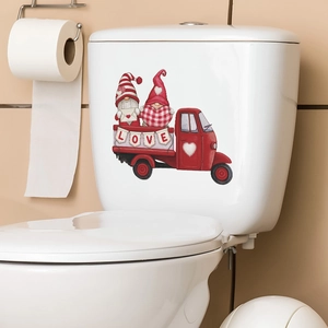 Valentine's Day gnomes in a red truck decal on a white bathroom toilet tank cover